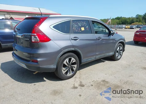 2016 Honda Cr-V Touring z USA, uszkodzony, nr VIN 5J6RM4H93GL108489